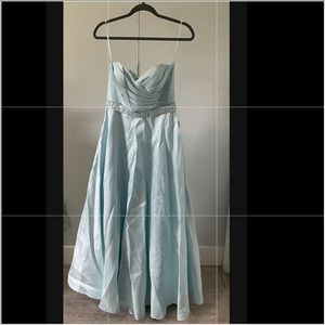 B. Darlin Strapless Pleated-Bodice Metallic
Ball Gown